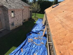 Roof stripped of cedar shingles ready for asphalt shingle installation from Davidoff Roofing
