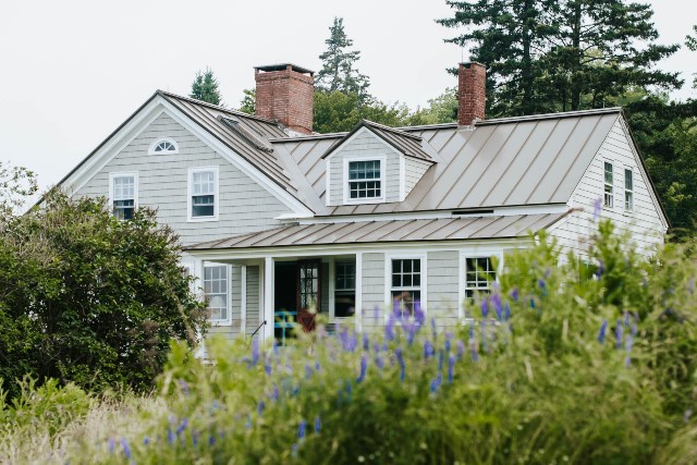 Exterior of home showing newly installed roof