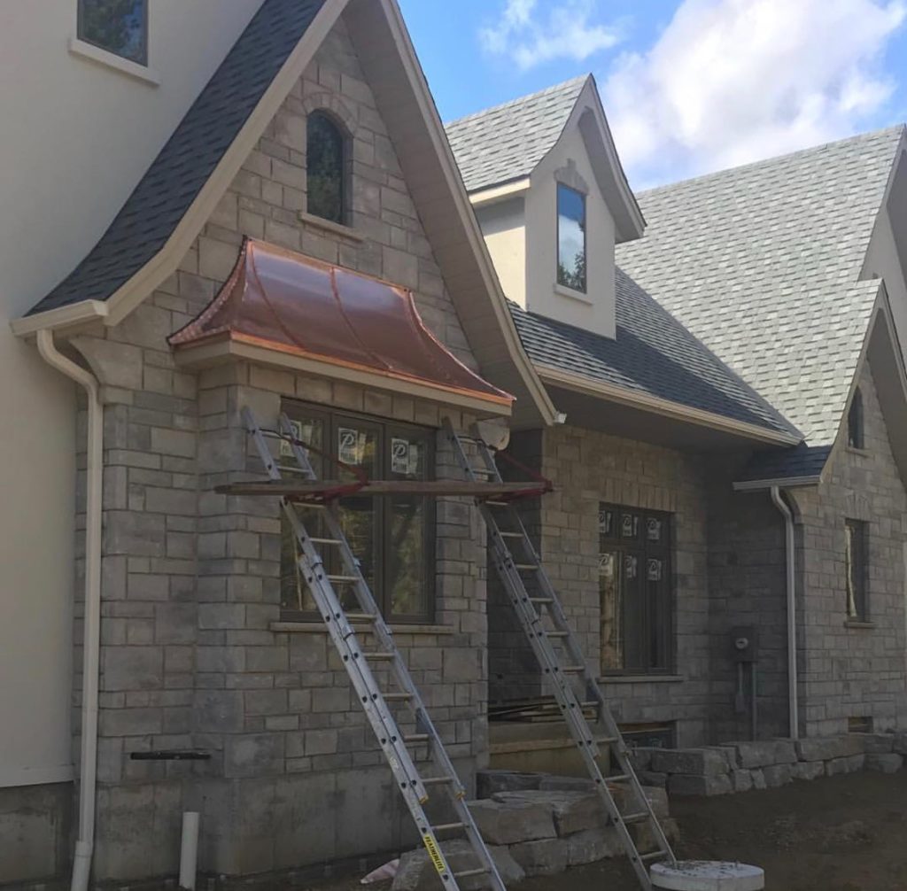 Davidoff Roofing professional installing a copper roof