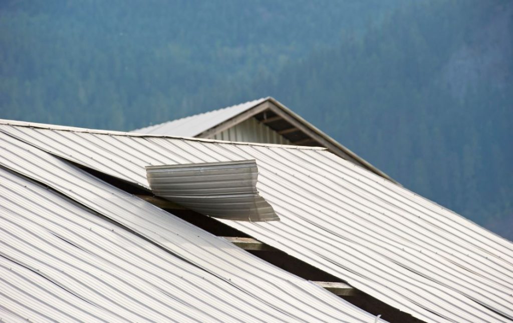 Wind damage on a commercial roof