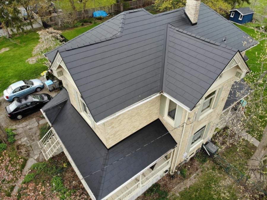 Steel roof shingles on a residential roof
