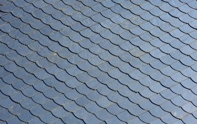 Close up of grey slate roof tiles