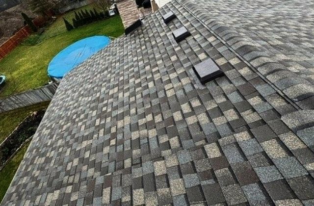 Multiple colored Asphalt Shingles installation for a London, Ontario home.